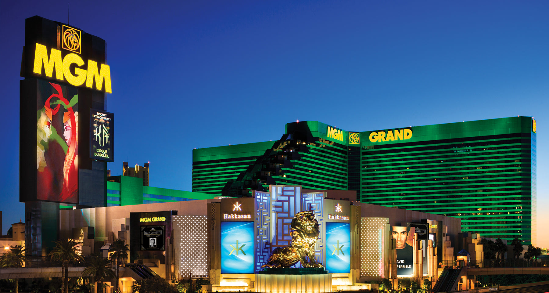 MGM Grand hotel and casino exterior at night with illuminated sign.